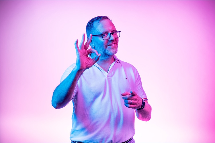 Man shows OK with thumb and index finger